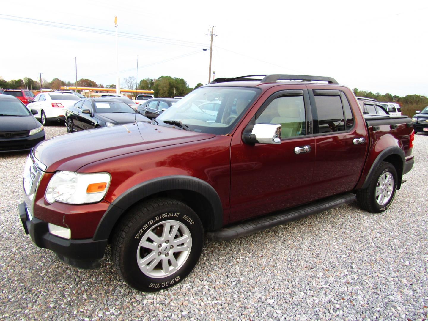 2010 Bronze /Tan Ford Explorer Sport Trac XLT 4.0L 2WD (1FMEU3BE3AU) with an 4.0L V6 SOHC 12V engine, Automatic transmission, located at 15016 S Hwy 231, Midland City, AL, 36350, (334) 983-3001, 31.306210, -85.495277 - Photo#2